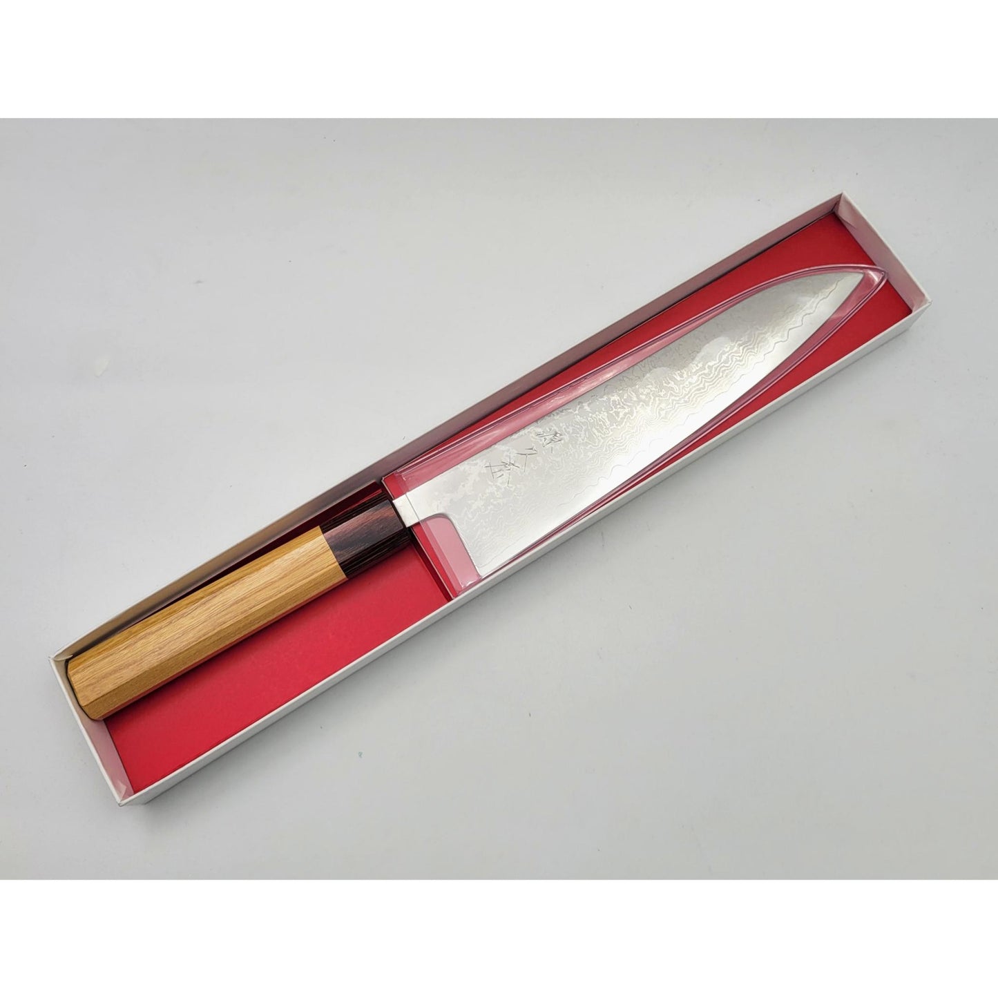 Japanese knives in hammered Damascus steel | Mahogany and Keyaki handle