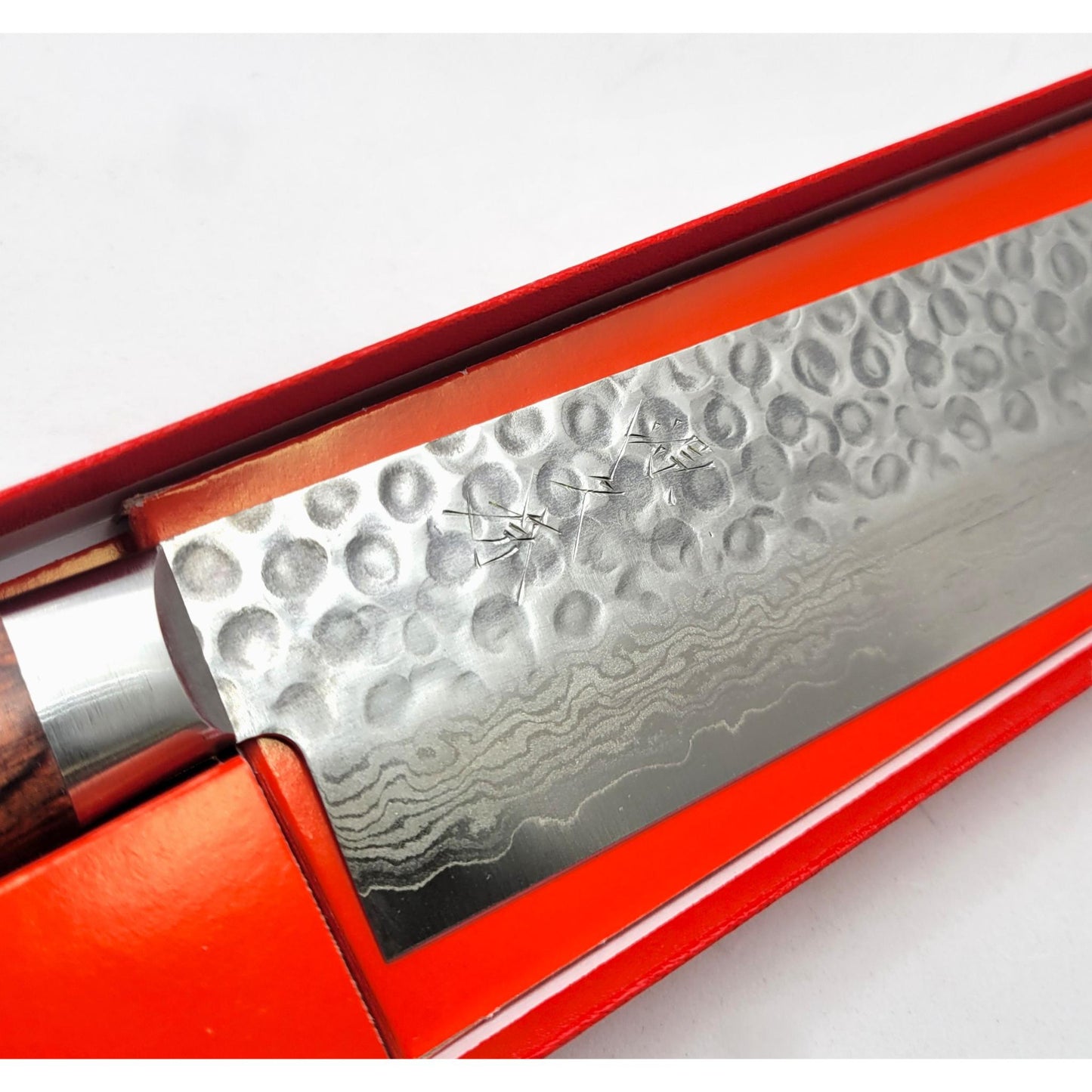 Japanese Knife in Hammered Damascus Steel