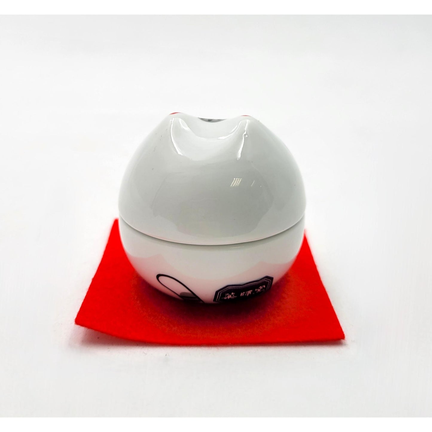 Boîte Maneki Neko levant les deux mains