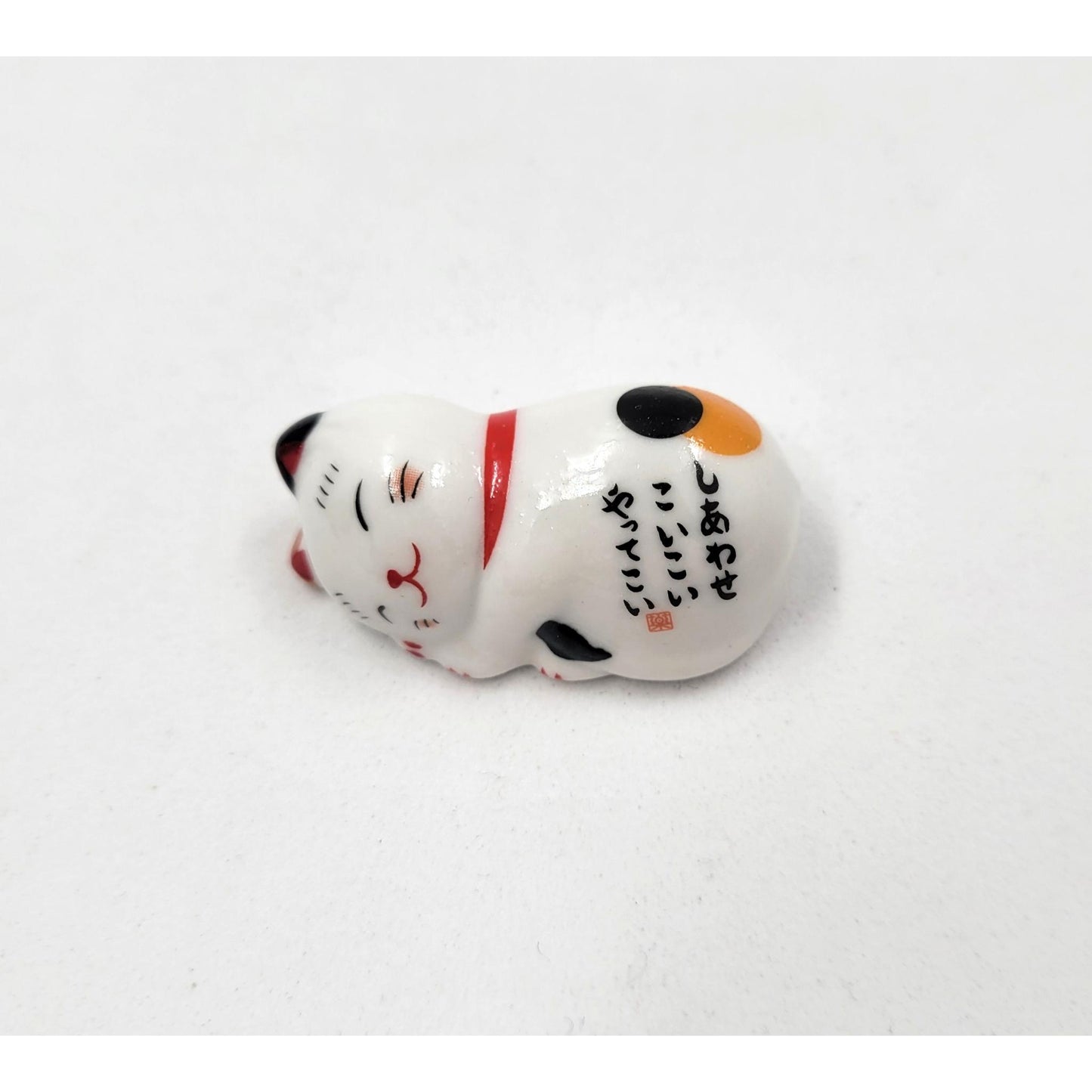 Repose-baguettes en forme de  Maneki neko